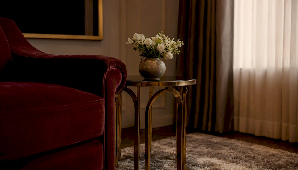 Elegant luxury living room corner with burgundy armchair