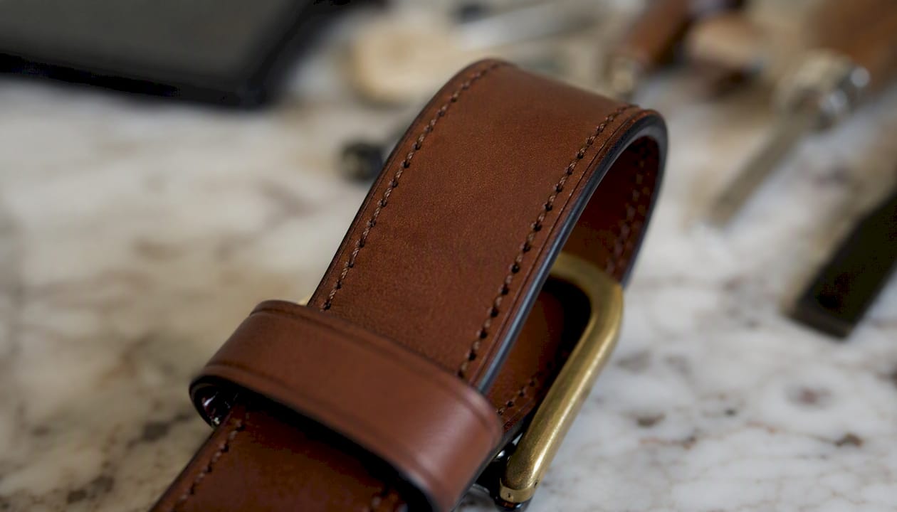 Detailed leather accessory edge and hardware
