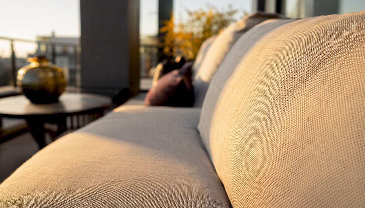 Close-up of luxury outdoor sofa fabric in sunlight