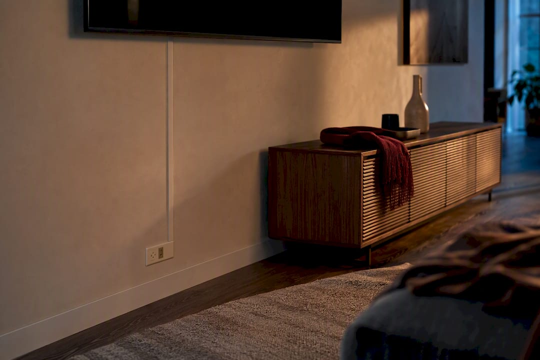 Elegant living room with concealed TV cable routing